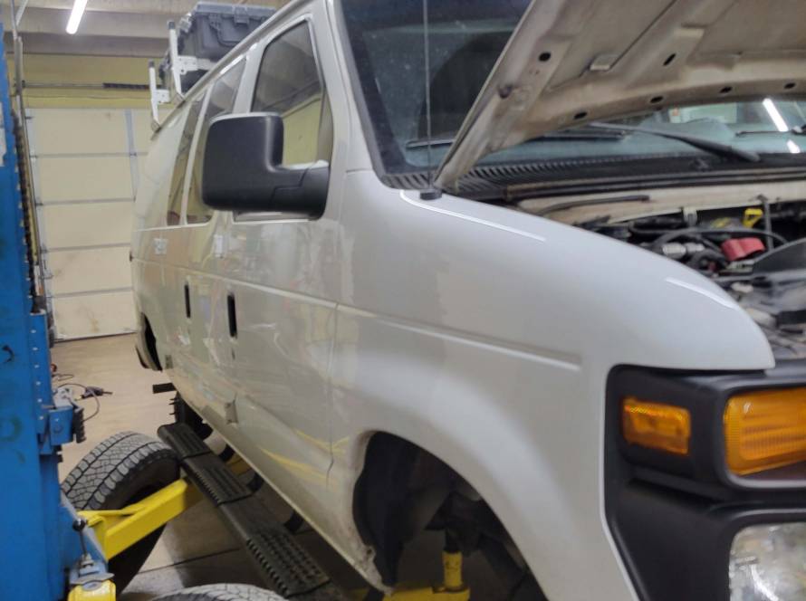 Car being checked for the Maryland State Inspection in Rockville, MD