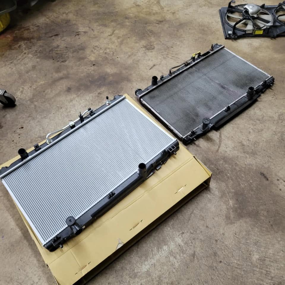 New radiator being installed in a car in Rockville, MD