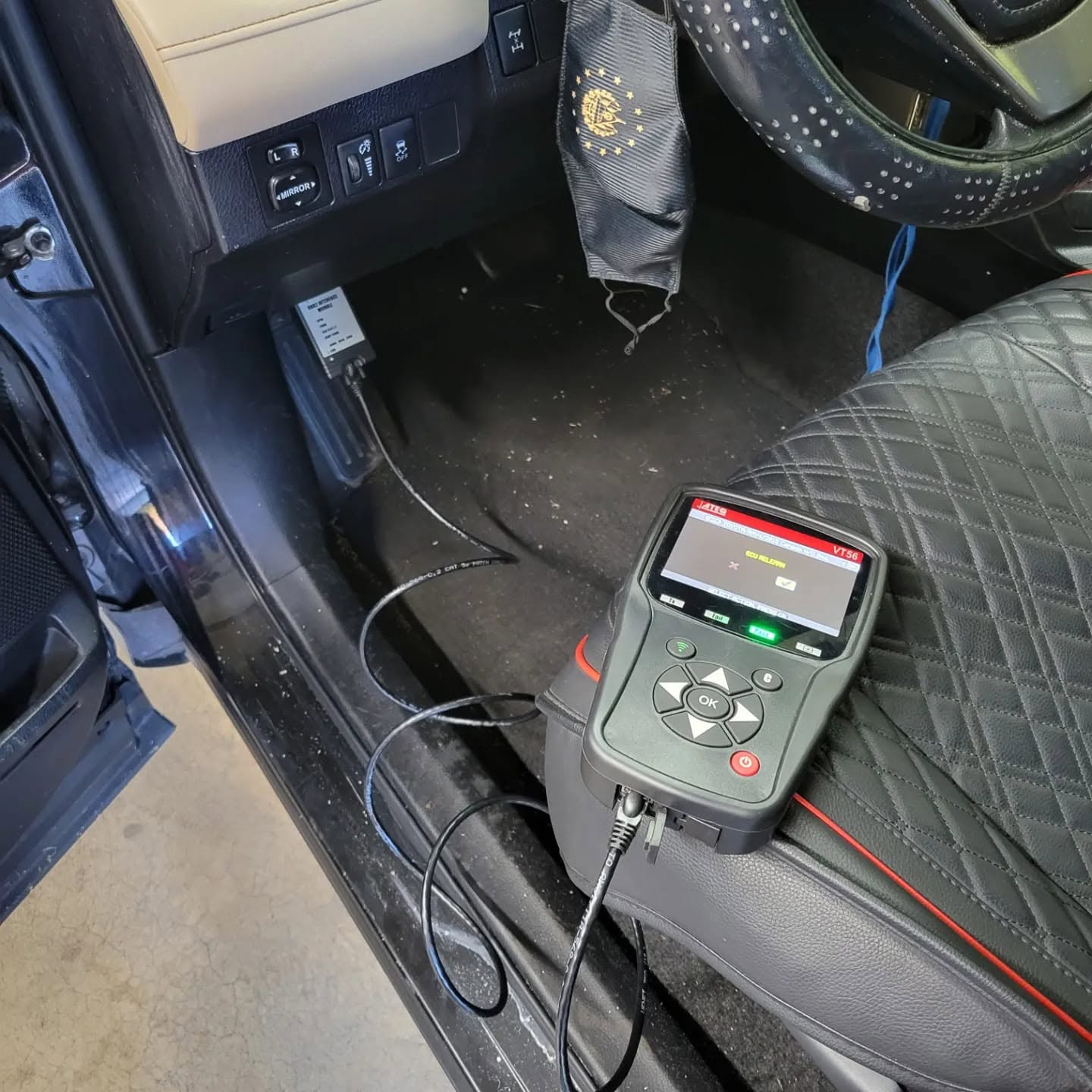 TPMS tool programming a tire pressure sensor in Rockville, MD